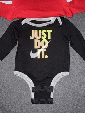 Nike Black Long-Sleeve Baby Bodysuit with Gradient Yellow-Green "Just Do It."